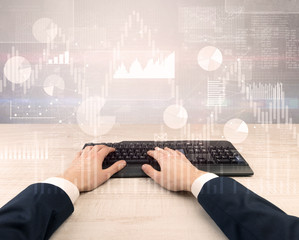 Fototapeta premium Elegant businessman hand typing with financial, report, graph, chart concept 