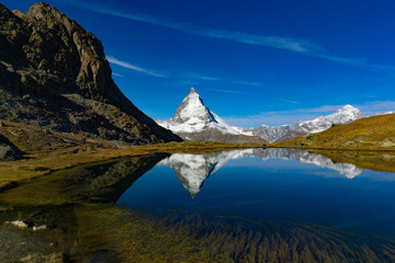 Matterhorn with reflection in the water in Zermatt Switzerland