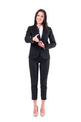 Elegant formal polite smiling business woman in suit offering hand for handshake. Full body isolated on white background. 