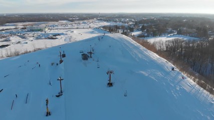 Snow park in Wisconsin, winter activities (tubing, skiing, snowboarding). Drone shots , bird's eyes view