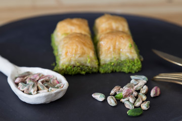 walnut, pistachio turkish style Antep Baklava presentation and service concept