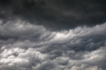 Dark or black clouds on the sky before storm raining.