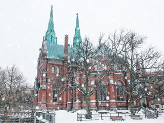 Obraz premium Church of St. John Lutheran Neo-Gothic style temple in the Finnish capital Helsinki in winter in snowfall
