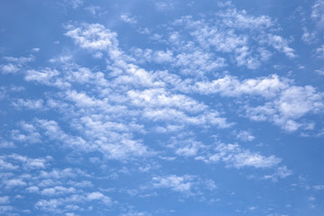 Naklejka na ściany i meble photo of blue sky and clouds or cloudscape.