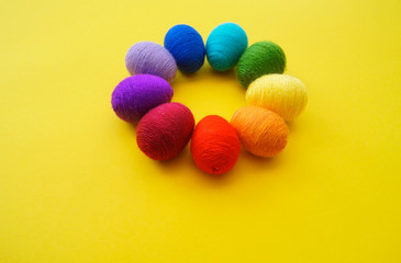 Easter eggs knitted from wool. Manual work. Rainbow. Easter.