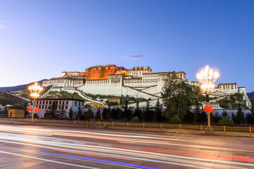 sun set scene of the Potala Palace from the Potala Palace Square in the front, Lhasa, Tibet, China....