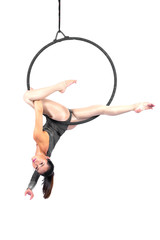 Beautiful woman Asian sport girl  fly yoga posing on hoop isolated white background , Aerialist gymnastics performs physical exercises - yoga concept