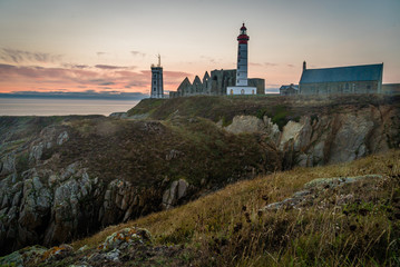 Saint Mathieu lighthouse in Brittany at sunset in France
