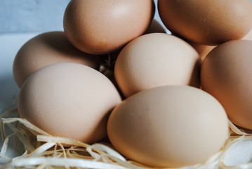 A lot of chicken eggs on the table