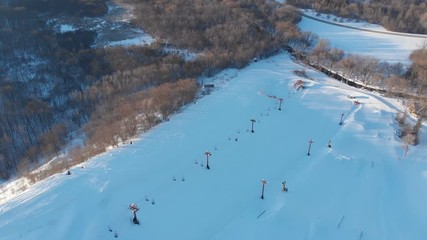 Snow park in Wisconsin, winter activities (tubing, skiing, snowboarding). Drone shots , bird's eyes view