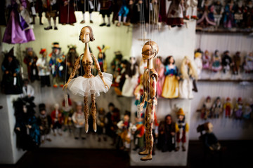 puppets hanging in the store