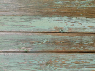  texture of old wooden boards with peeling paint