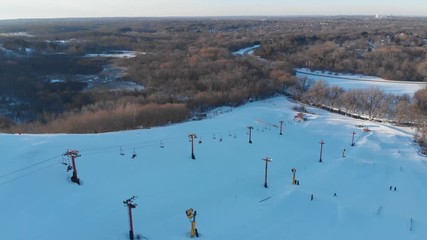 Snow park in Wisconsin, winter activities (tubing, skiing, snowboarding). Drone shots , bird's eyes view