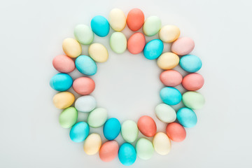 top view of traditional easter eggs in circle isolated on grey