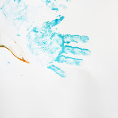 Fototapeta na wymiar Colorful hand prints of toddler kid on white background. Set of rainbow colored hand prints.
