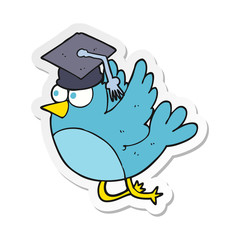 sticker of a cartoon bird wearing graduation cap