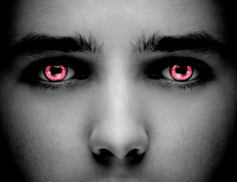 Evil black alien vampire or zombie eyes.   Close up shot.