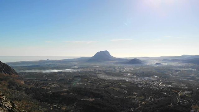 Aerial drone view of Segaria mountain, in Marina Alta, Alicante, Spain. Denia and Montg&oacute; mountain are in the background