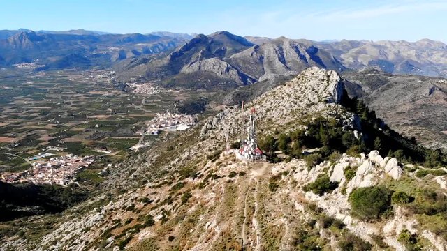 Aerial drone view of telecommunication antennas in Segaria mountain, in Marina Alta, Alicante, Spain