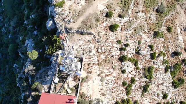 Aerial drone view of telecommunication antennas in Segaria mountain, in Marina Alta, Alicante, Spain