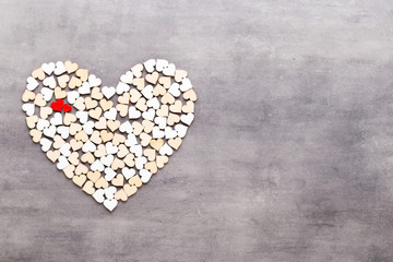 Happy Valentines day background. With small hearts on gray background.