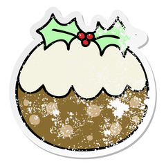 distressed sticker of a quirky hand drawn cartoon christmas pudding