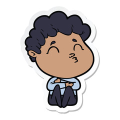 sticker of a cartoon man pouting