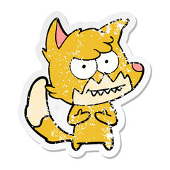 distressed sticker of a cartoon grinning fox