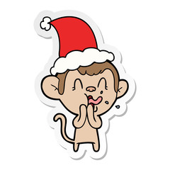 crazy sticker cartoon of a monkey wearing santa hat