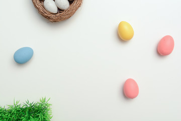 Easter eggs on white background with copy space