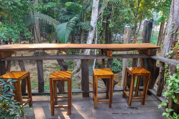 table scene and tree in background at coffee cafe