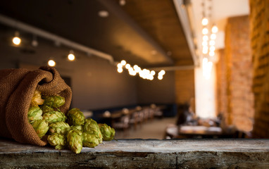 Still life with a keg of beer and hops.