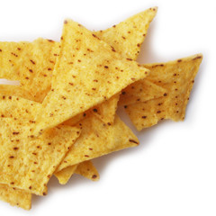 Fototapeta premium Corn Totillas chips isolated on white background. Mexican food also called Nachos