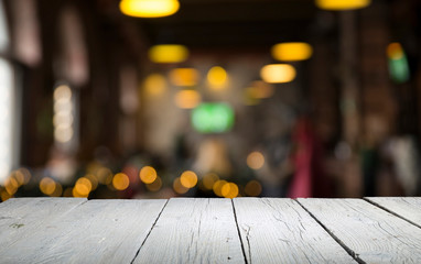 Beer barrel with beer glasses on a wooden table. The dark brown background.