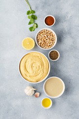 Fototapeta na wymiar Hummus ingredients - chickpea, lemon, garlic, sesame, olive oil