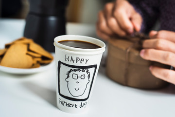 man and cup of coffee with text happy fathers day