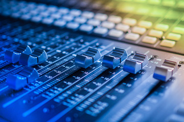 Fototapeta premium Audio sound music mixer closeup - digital sound studio mixer with faders