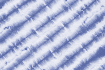 striped tie dye pattern hand dyed on cotton fabric abstract background.