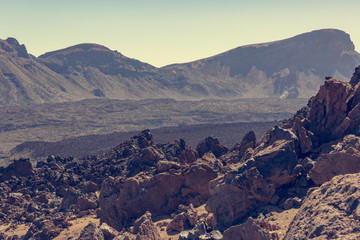 Spectacular volcanic landscape in desert environment with wicked lava shapes.
