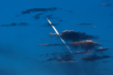 Fototapeta na wymiar the plane flies through the clouds