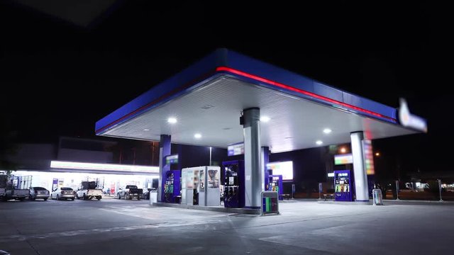 Time lapse of gas station, car refuel the energy