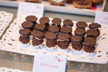 Table with delicious candy, cupcakes, cakepops, macaroons and other sweets