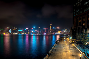 Fototapeta na wymiar Hong Kong cityscape at night. Victoria Harbor of Hong Kong city at night