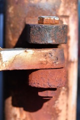 A rusty door hinge.