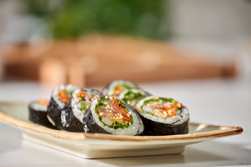 Korean roll Gimbap(kimbob) made from steamed white rice (bap) and various other ingredients
