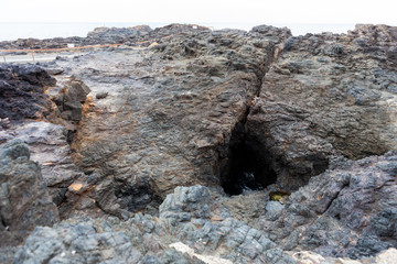 Kiama Blowhole, NSW, Australia. Natural hole in earth close to sea through which sea water occasionally bursts.