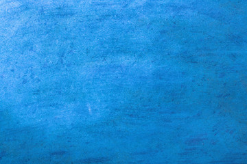 Blue background of pressed cardboard with fine texture.