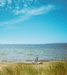 Sandy dunes with driftwood near Lake Superior