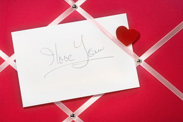 I love you message card handwriting on pinup board