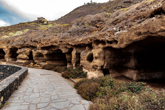 Puerto de la Cruz, Tenerife, Canaria - These ancient caves carved in stone used to serve as accommodation for people. Today this is a nature reserve on the coast in the north of Tenerife near Puerto d
